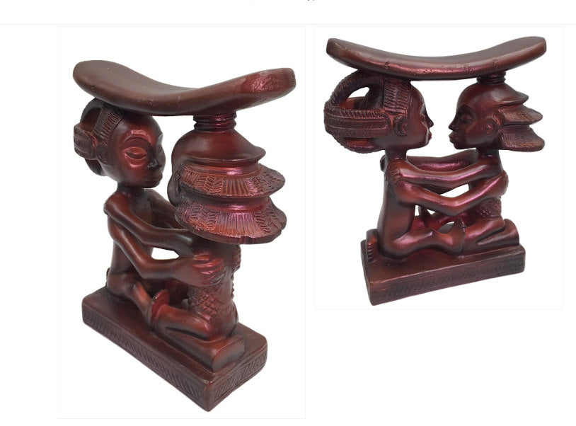 African couple headrest carving museum replica two different views of the sculpture
