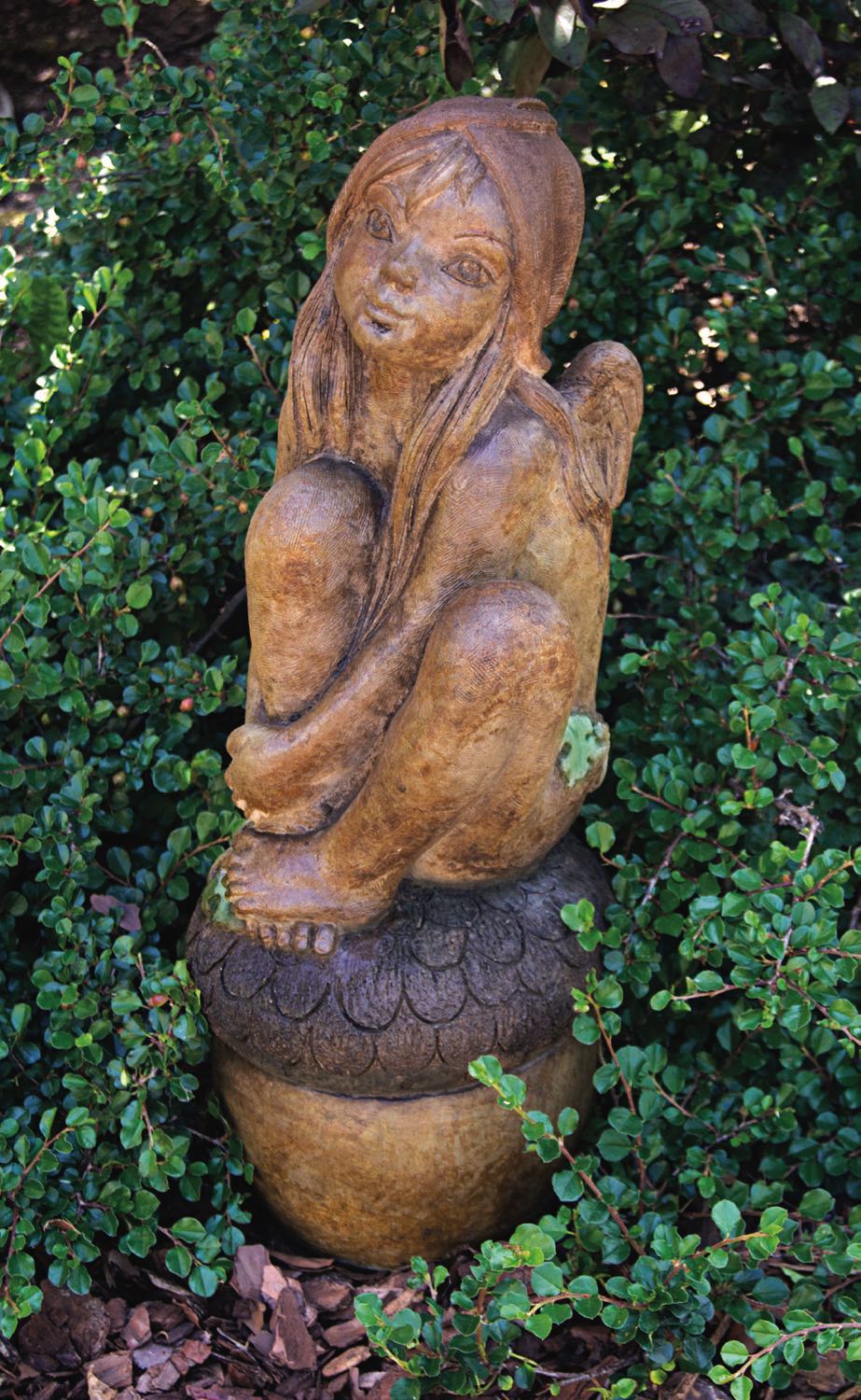 Whimsical fairy child statue for garden pixie