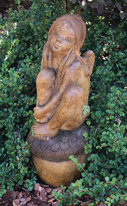 Whimsical fairy child statue for garden pixie