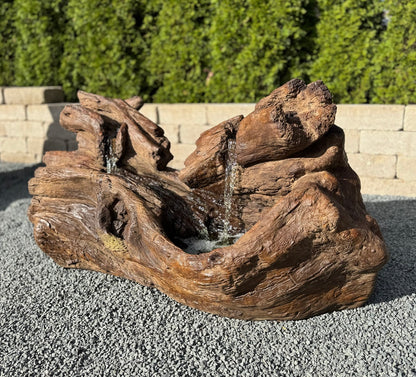 Fallen Logs Fountain Driftwoods Water feature with light in basin flowing falls