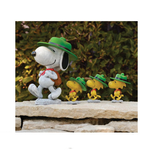 Snoopy leading three Woodstock Beagle Scouts in a four-piece garden statue set