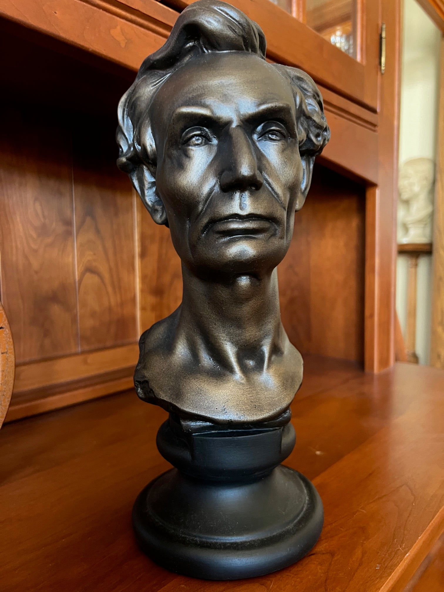 Young Abraham Lincoln portrait bust by Volk showing pre-presidential likeness in bronze finish