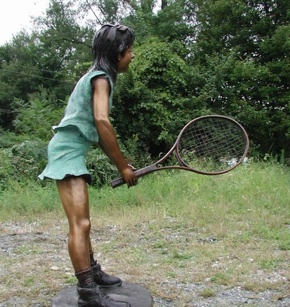 Side view Girl Swinging a Tennis Racket Bronze Statue playing life size