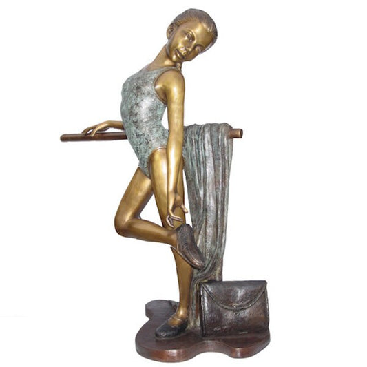 Bronze Young Girl Standing at Barre Sculpture preparing to practice statue