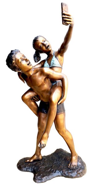 Bronze Girl and Boy Taking a Selfie Sculpture Bathing Suits Photos