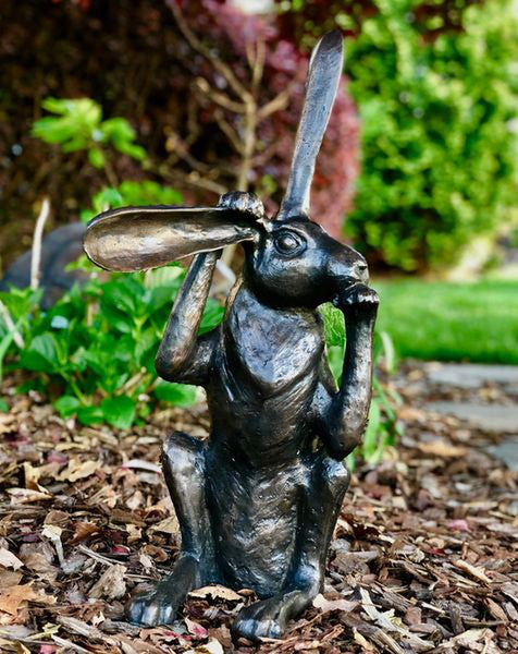 Rabbit statue holding on to his ear garden sculptures retro modern art