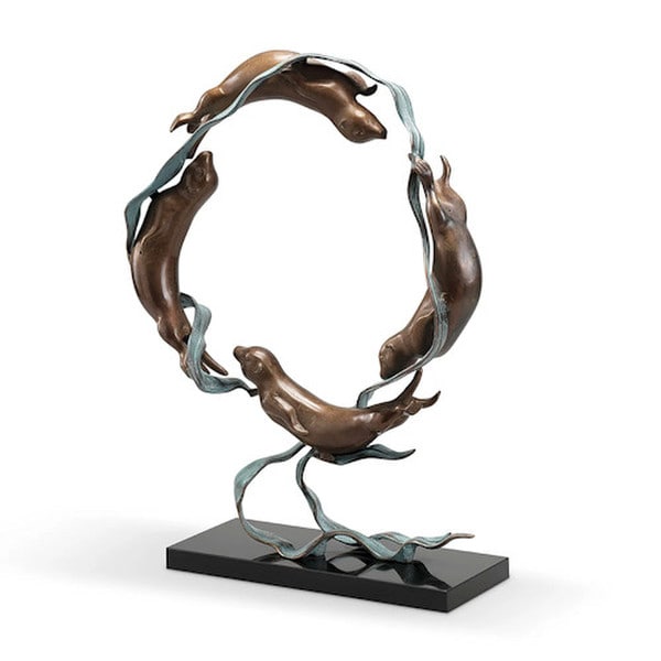 Sea Otter Spectacle Sculpture on Marble Base swimming in a circular motion