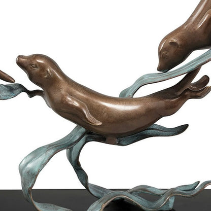Close Up sculpture depicts a sea otter swimming in a circular motion