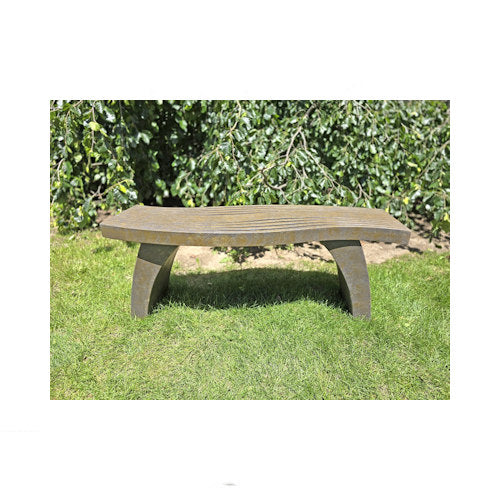 Zen garden seating with arched cast stone supports soft Asian-inspired influence