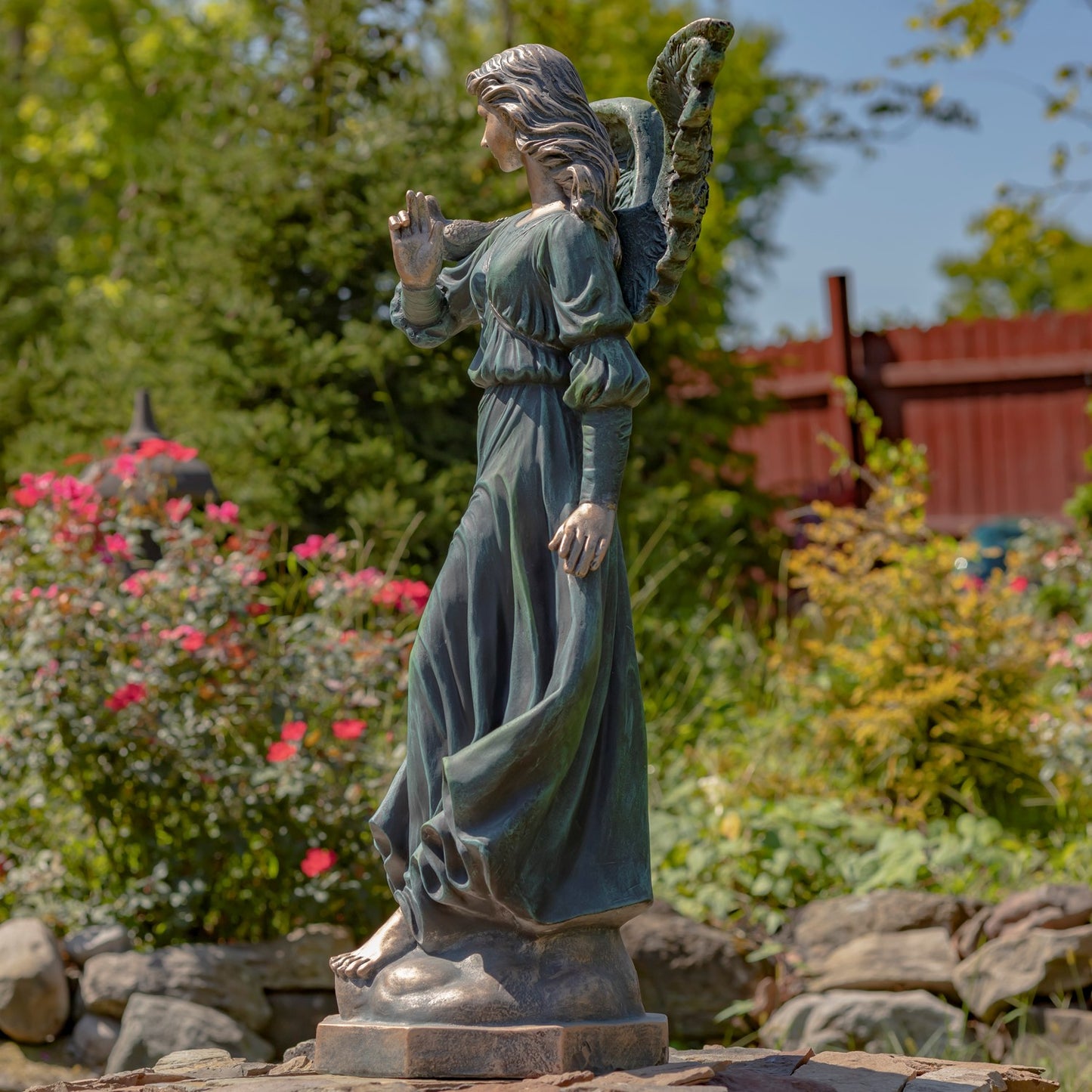 large outdoor angel sculpture stone finish guardian angel décor side view