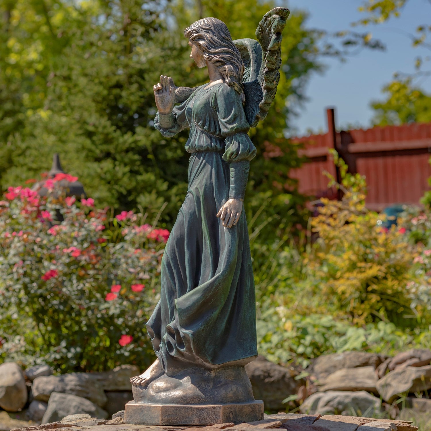 large outdoor angel sculpture stone finish guardian angel décor side view