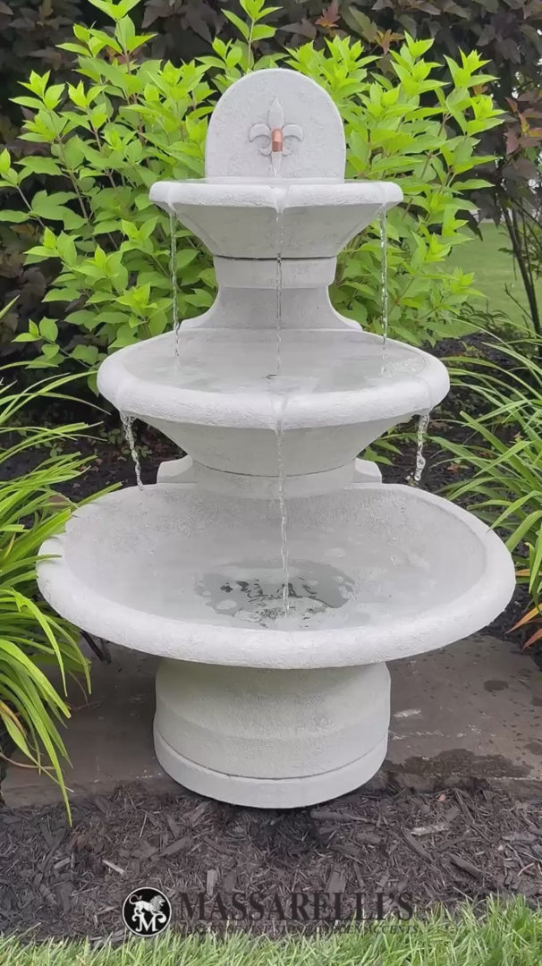 Video Fleur De Lis Tiered Wall Garden Fountain captures the refined beauty of French design with its graceful form and timeless detailing