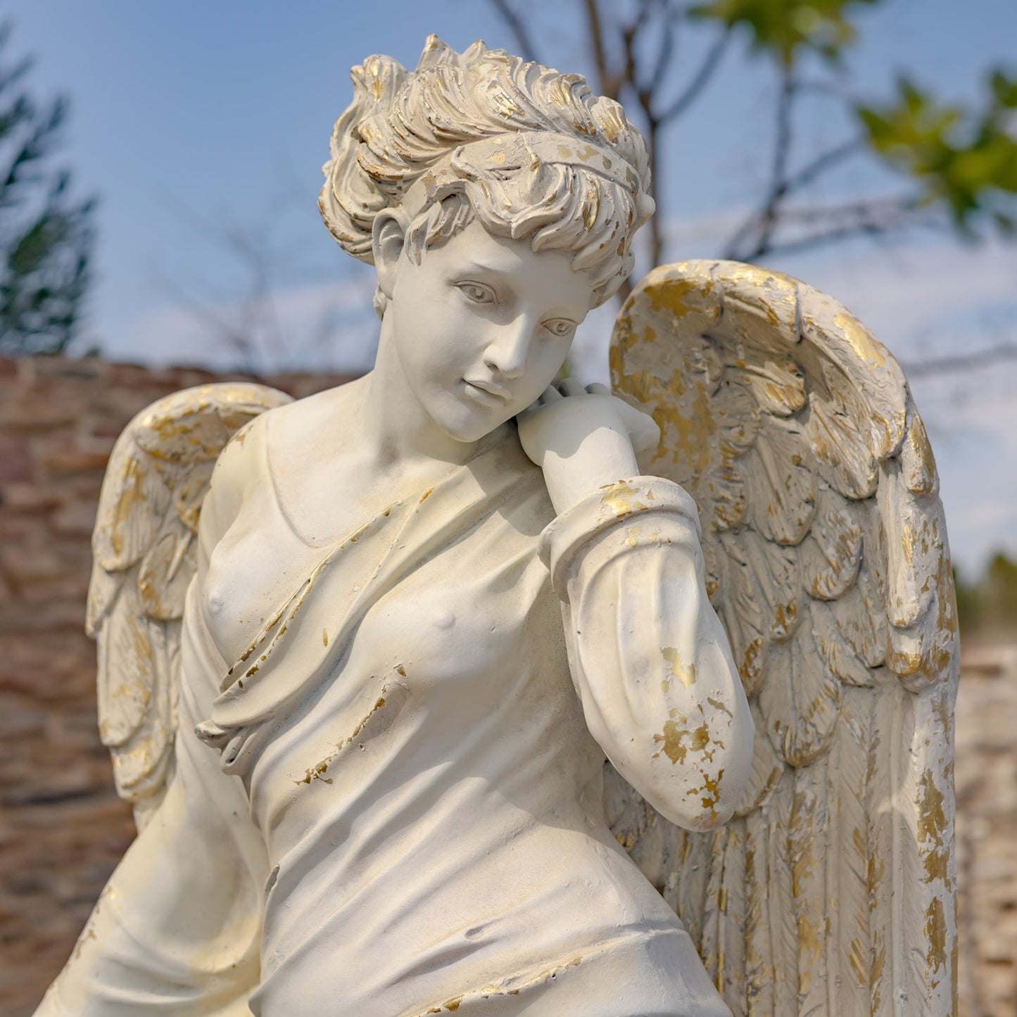 the Muse of the Heavens Life-Size Angel Statue angelic face features with wings